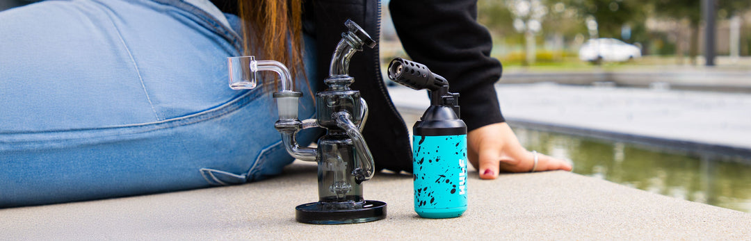 woman at park with Wulf Mods Dab Rig and Torch