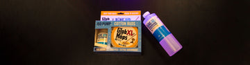 Wholesale Bong Aid x Glob Mop kit with cleaner laying down on black office desk.