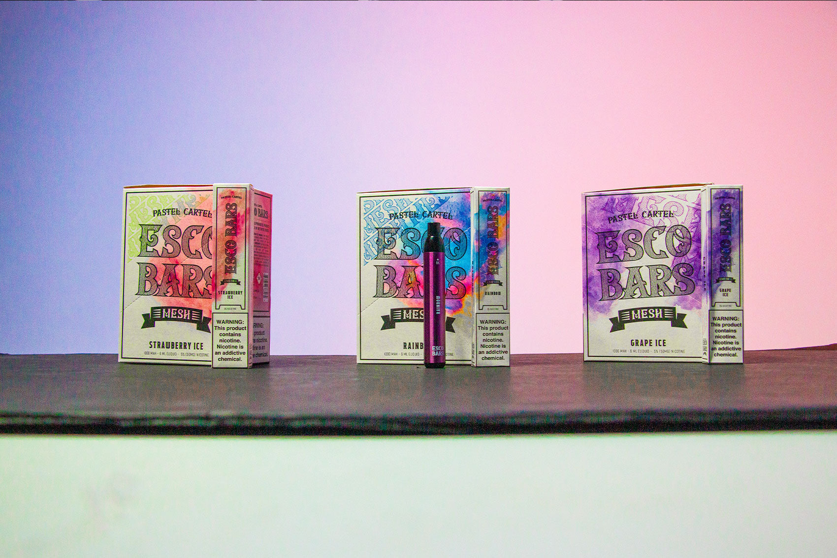 Wholesale Pastel Cartel Esco Bars 3 different packs standing in a row in colorful studio background
